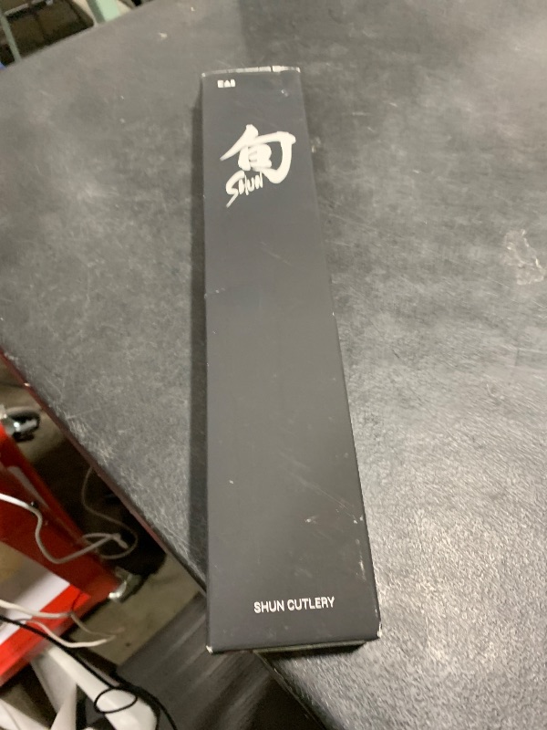 Photo 1 of Shun Premier 8" Chef's Knife, Handcrafted Japanese Kitchen Knife for Professional and Home Chefs, VG-MAX Core with Damascus Stainless Steel Cladding, Pakkawood Handle