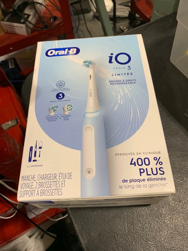 Photo 1 of Oral-B iO Series 3 Limited Rechargeable Electric Powered Toothbrush, Blue with 2 Brush Heads and Travel Case - Visible Pressure Sensor to Protect Gums - 3 Modes - 2 Minute Timer