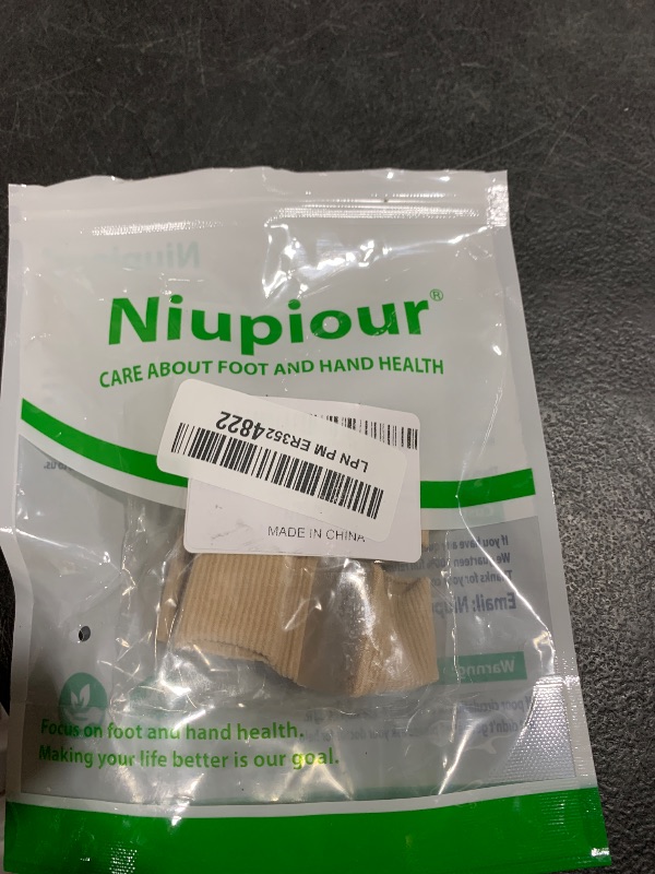 Photo 1 of Niupiour Gel Bunion Toe Separators W/Fabric Lining for Big Toe, Silicone Toe Spacers Bunion Correctors for Overlapping Toe, Breathable Toe Corrector Protector for Women and Men, Relieve Foot Pain