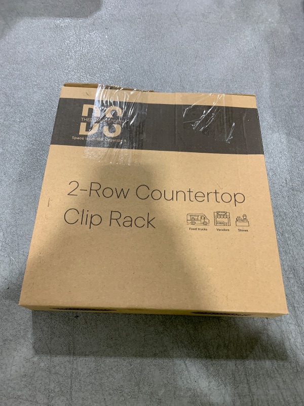 Photo 1 of DS THE DISPLAY STORE Black 2-Row Potato Chip Rack Display Stand with 26 Clips, Snack Retail Display Rack, Chip Stand Display for Party, Countertop Chip Bag Holder, Snack Display for Counter