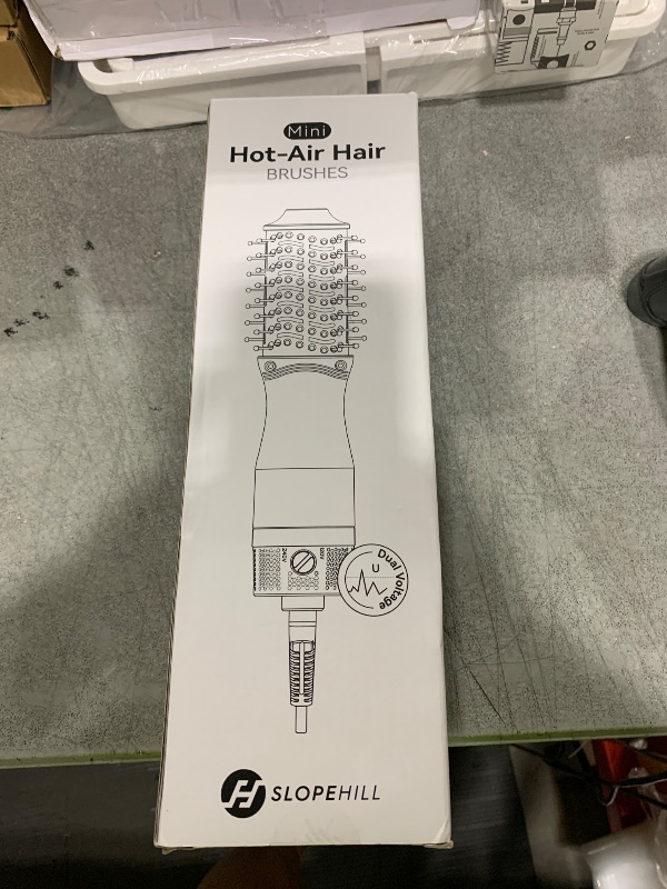 Photo 1 of slopehill Mini Dual Voltage Hair Dryer Brush,1000 Watts Travel Hot Air Brush with European Plug, Ionic One Step Hair Dryer and Styler for Women for Home & Salon, 2 Heat & 2 Speed Settings