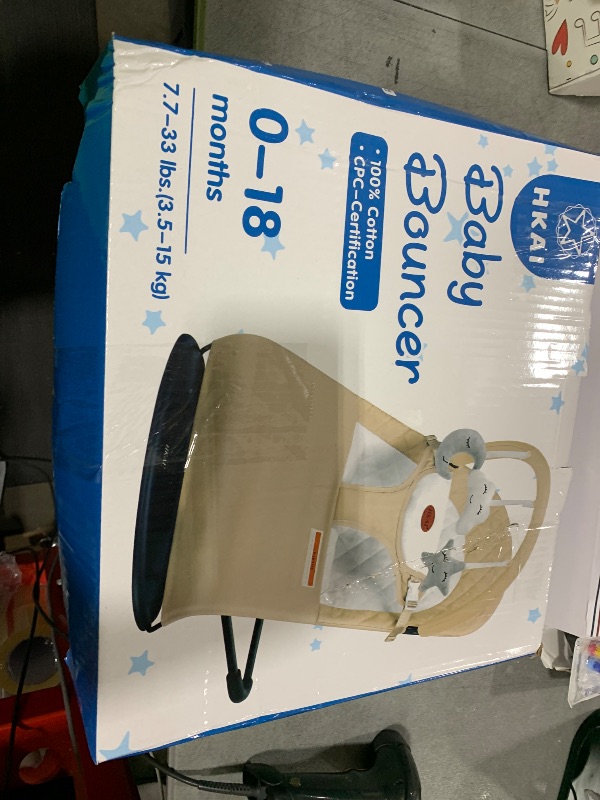 Photo 1 of HKAI Baby Bouncer, Portable Baby Bouncer Seat for Babies 0-18 Months, 100% Cotton Fabrics, 3 Modes of use with Rocker and Stationary Options, Infant Rocker Chair with Hanging Toys-Organic Oat