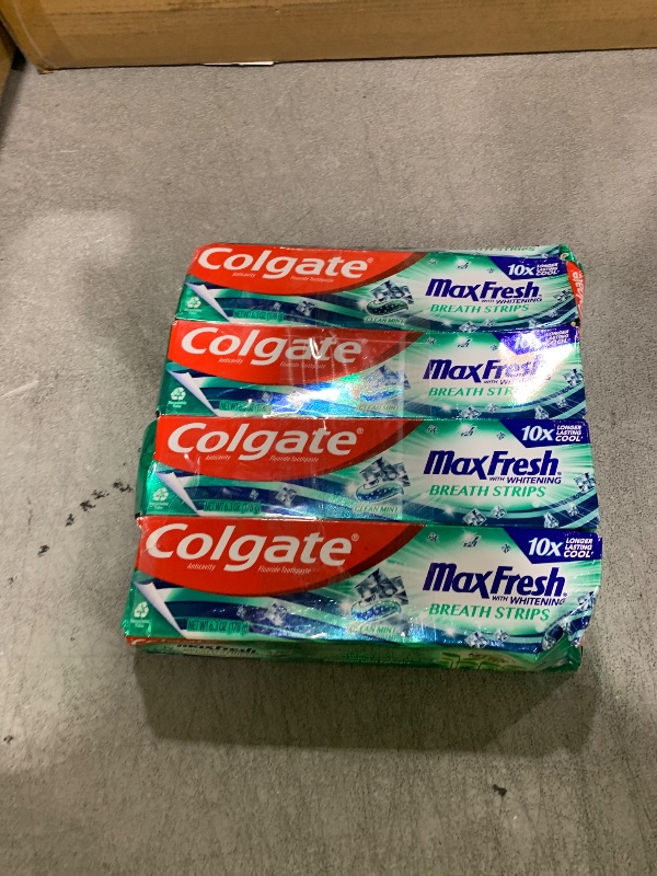 Photo 1 of Colgate Max Fresh Whitening Toothpaste with Mini Strips, Clean Mint Toothpaste for Bad Breath, Helps Fight Cavities, Whitens Teeth, and Freshens Breath, 6.3 Ounce (Pack of 4)