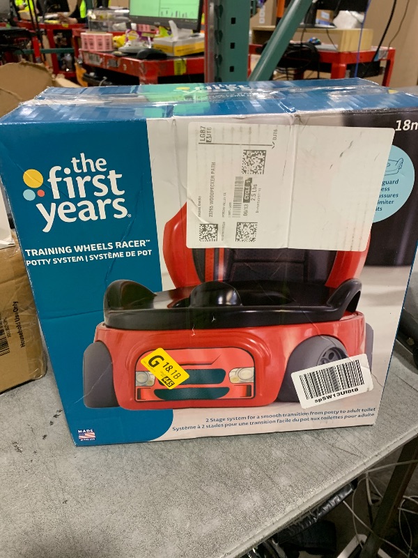 Photo 1 of The First Years Training Wheels Racer Potty Training Toilet - Race Car Training Potty - Includes Detachable Toddler Toilet Seat and Kids Potty - Ages 18 Months and Up