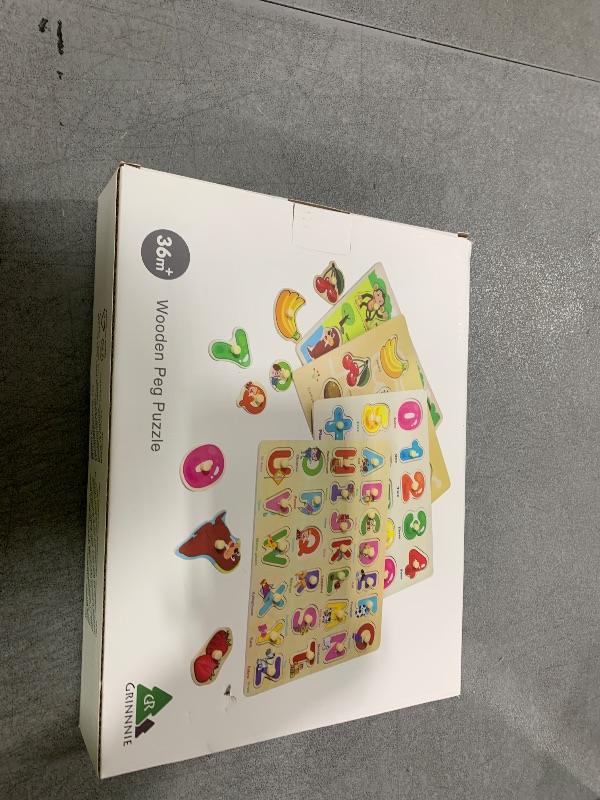 Photo 1 of GRINNNIE Wooden Peg Puzzle for Toddlers 2 3 4 Years Old, 4 PCS Montessori Educational Learning Puzzles Set-Numbers, Letters, Animals and Fruits, Great Preschool Gifts for Girls and Boys