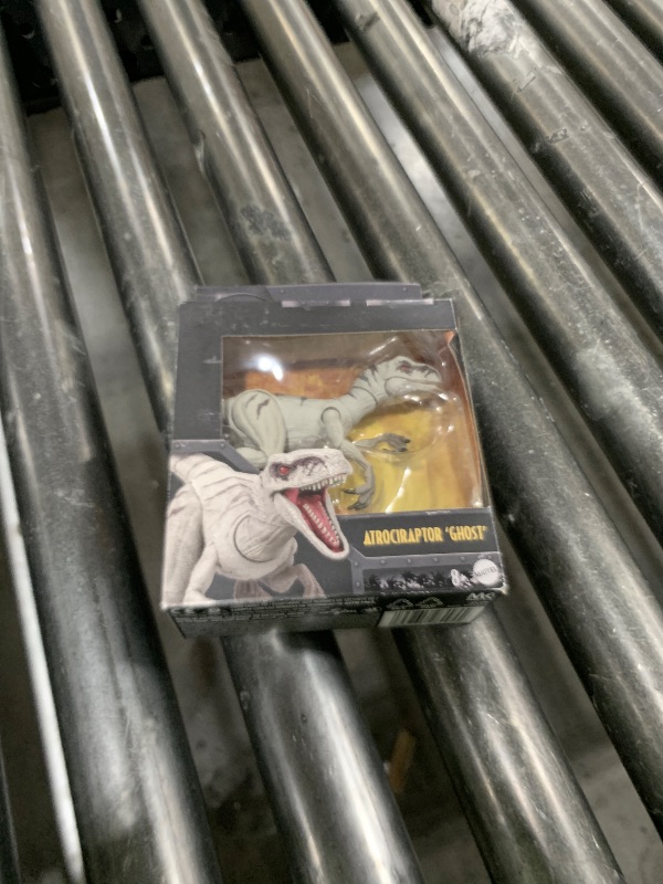 Photo 1 of Mattel Jurassic World Hammond Collection Dinosaur Action Figure Toy, Atrociraptor Ghost, Premium Movie Design with Glass Eyes & 14 Points Articulation