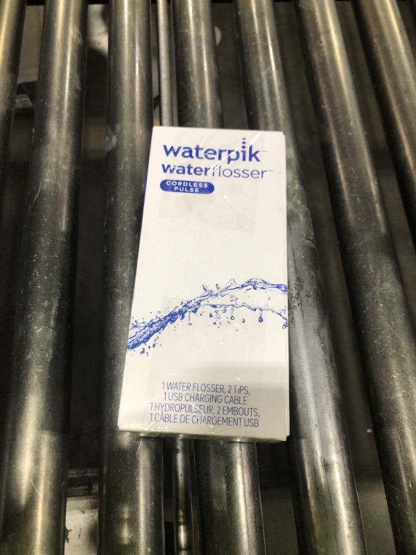 Photo 1 of SEE NOTES .........Waterpik Cordless Pulse Rechargeable Portable Water Flosser for Teeth, Gums, Braces Care and Travel with 2 Flossing Tips, Waterproof, ADA Accepted, WF-20 White, Packaging May Vary