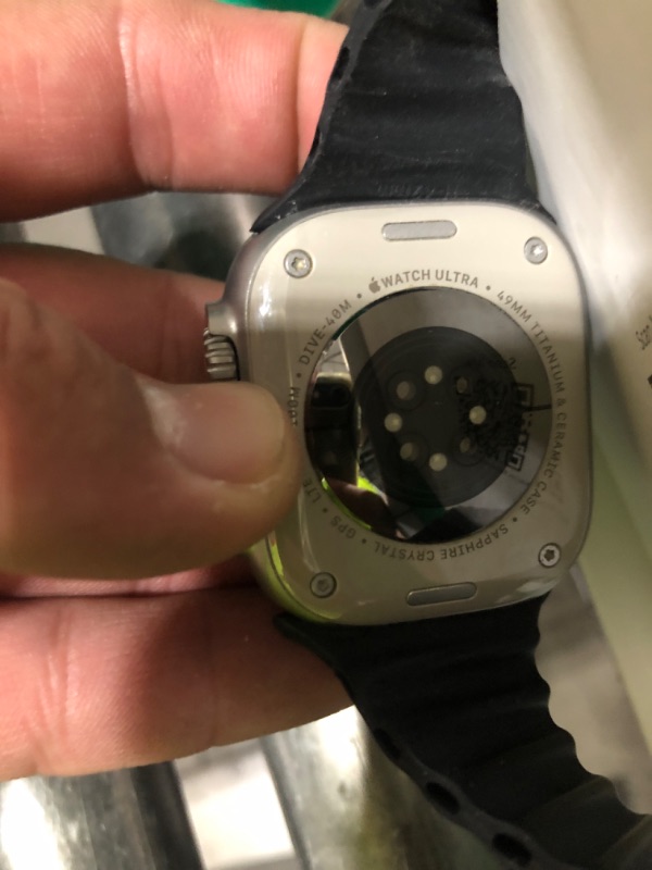 Photo 1 of Apple Watch Ultra [GPS + Cellular 49mm] Titanium Case with Midnight Ocean Band, One Size (Renewed Premium)