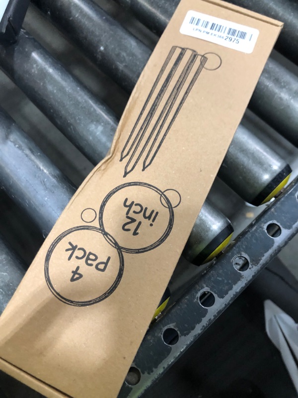 Photo 1 of SONEDLY 12 inch Taper Candles 4 Pack - Long Burning Dripless and Smokeless - Ideal for Halloween and Witchcraft - 10-Hour Coal Black Candlesticks