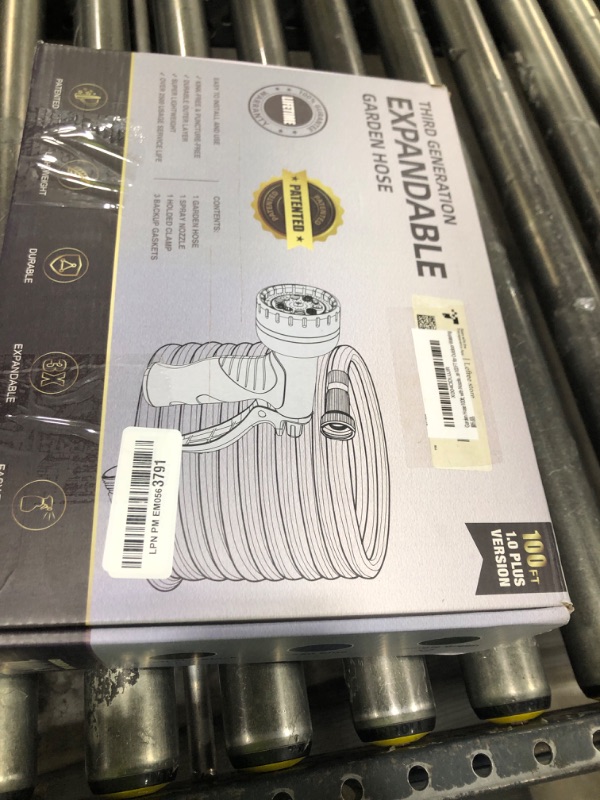 Photo 1 of Garden Hose 100ft, with Nozzles for Yard, Outdoor - Never Kink & Tangle, Flexible Water Hose 100 FT for Outdoor Watering