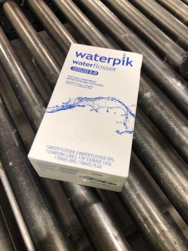 Photo 1 of Waterpik Cordless Advanced 2.0 Water Flosser For Teeth, Gums, Braces, Dental Care With Travel Bag and 4 Tips, ADA Accepted, Rechargeable, Portable, and Waterproof, White WP-580, Packaging May Vary