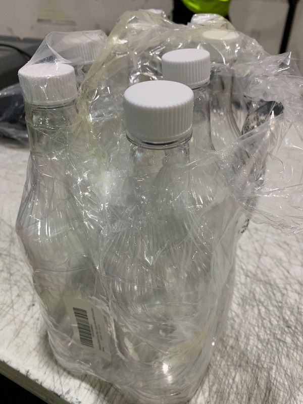 Photo 1 of Noamus 8 Pack 33 oz Plastic Soda Bottles with Caps, 1L Reusable Empty Clear PET Juice Container, Disposable Wine Bottles with White Lid for Drinking Beverage Water Liquor Beer Milk Smoothies