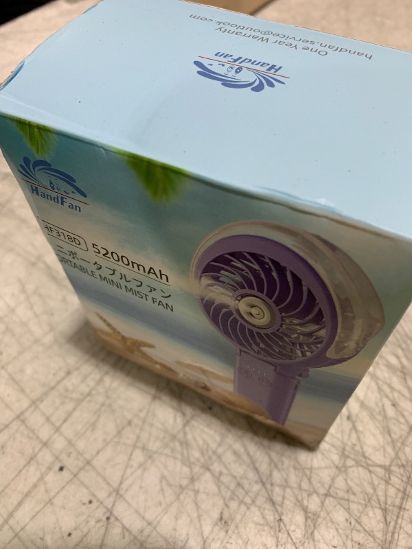 Photo 1 of HandFan 5200mAh Upgraded Portable Misting Fan, Rechargeable Handheld Mister Fan, Spray Water Mist Fans, Mini Cooling AC Ice Fans for Beach Travel Concerts, Gifts for Women(Light Purple)