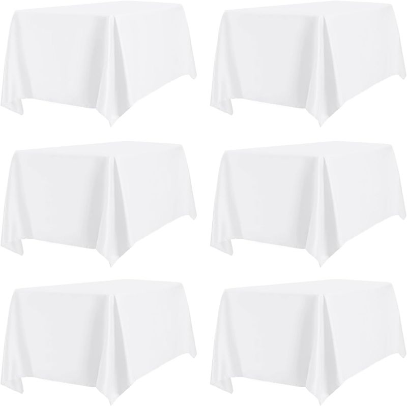 Photo 1 of PureFit 6 Pack Rectangle White Table Cloths 60 x 102 Inch for 6Ft Tables, Stain and Wrinkle Resistant Table Linens for Home Use, Wedding, Party, Banquet and Camping