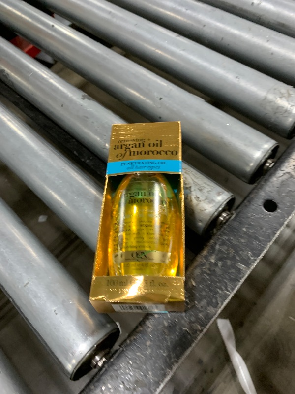 Photo 1 of OGX Renewing + Argan Oil of Morocco Penetrating Hair Oil, 24 Hour Frizz Control Argan Oil Treatment for All Hair Types Repairs Split Ends & Boosts Shine, Paraben-Free Formula, 3.3 fl. oz