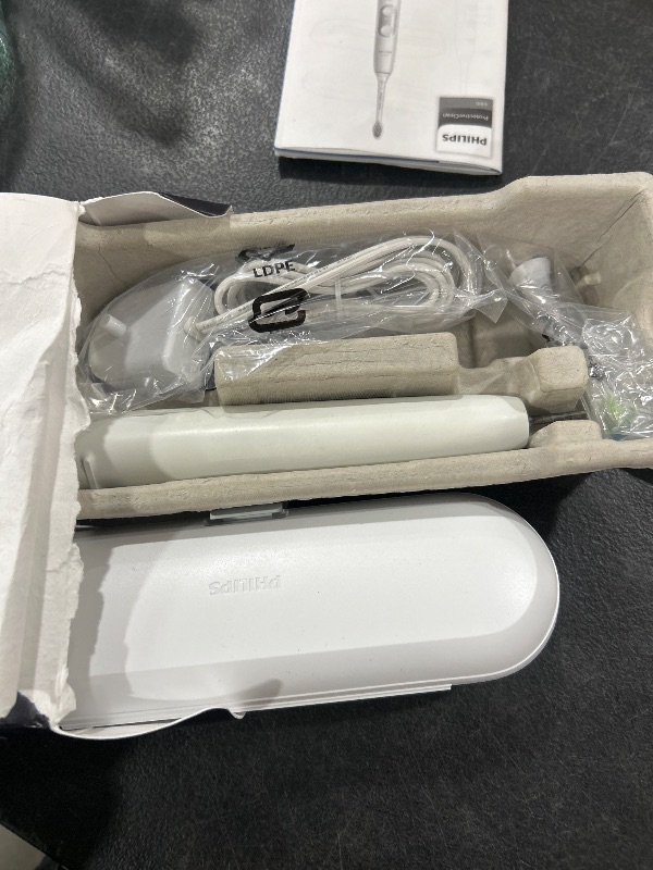 Photo 1 of PHILIPS Sonicare ProtectiveClean 6100 Rechargeable Electric Toothbrush, with Pressure Sensor, 3 Cleaning Modes, SmarTimer and QuadPacer, 14-Day Battery Life, Travel Case, White, Model HX6877/21