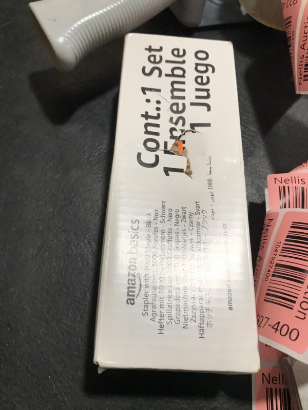 Photo 1 of Amazon Basics Stapler with 1000 Staples, Office Stapler, 25 Sheet Capacity, Non-Slip, Black