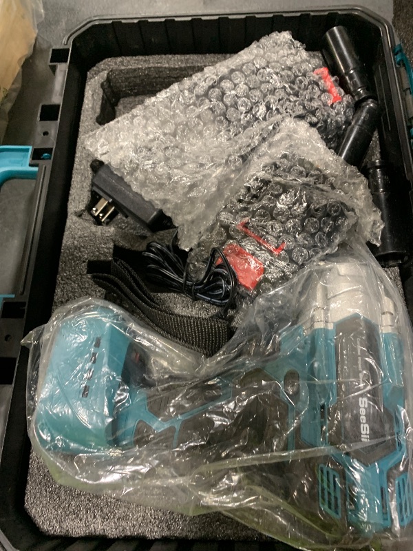 Photo 1 of Seesii Impact Wrench 665 FT-LBS(900N.m) 3300IPM 1/2 Impact Gun High Torque Electric Cordless Impact Wrench with 21V 2x4.0Ah Battery 6 Sockets and Case for Home Car Truck Tire Lug Nut Removal Tool Set