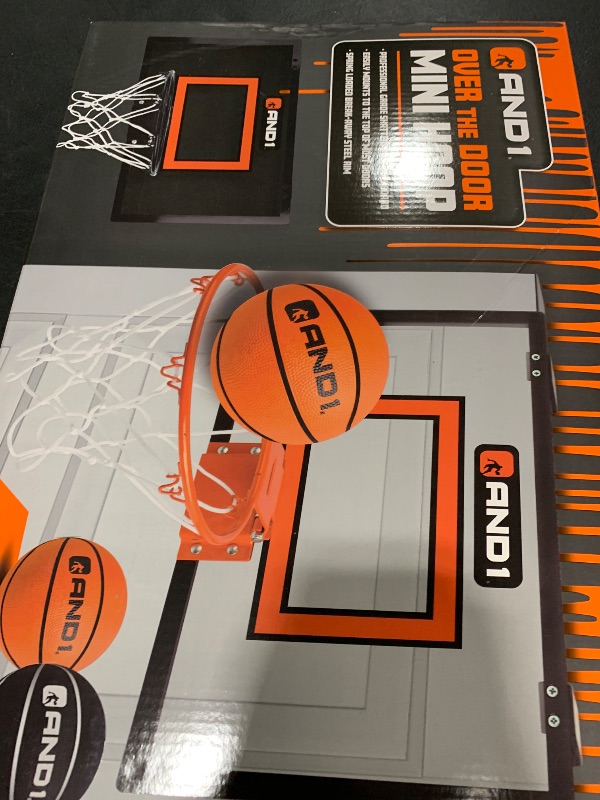 Photo 1 of AND1 Over The Door Mini Basketball Hoop: 18x12 Shatterproof Backboard, 2 Mini Basketballs, and Hand Pump Included- Ultimate Indoor Basketball Accessory for Kids and Adults, No Tools Required