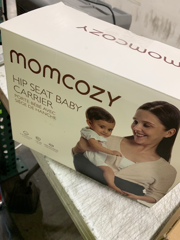 Photo 1 of Momcozy Hip Seat Baby Carrier - Adjustable Waistband with Original 3D Belly Protector, Ergonomic Carrier with Various Pockets for Newborns & Toddlers up to 45lbs (Black, Large)