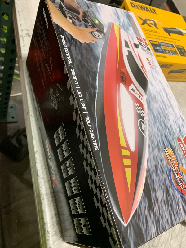 Photo 1 of RC Boat for Kids and Adults, Remote Control Boat for Pool Lake River and Sea, 30KPH High Speed Ship Toy with 3 Speed Levels, Self-Righting, Waterproof and One Key Demo 2 Rechargable Batteries