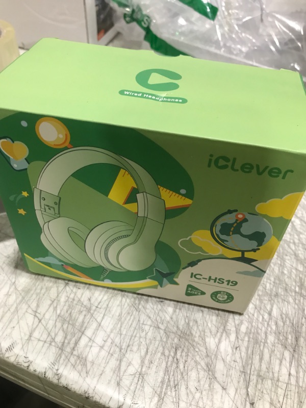 Photo 1 of iClever Kids Headphones for School Travel, Safe Volume 85dBA, Stereo Sound Over-Ear for Kid, Foldable 3.5mm Wired Dinosaur Headphones for iPad Computer, HS19S
