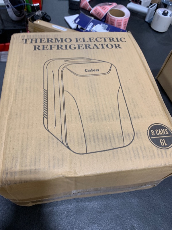 Photo 1 of CALEN Mini Fridge with 2 Bottles, 6L/8 Cans Mini Fridge for Bedroom, Skincare Fridge 110V AC/12V DC Small Refrigerator for Food, Beverages, Cosmetics, Portable Mini Refrigerator for Office, Dorm, Car