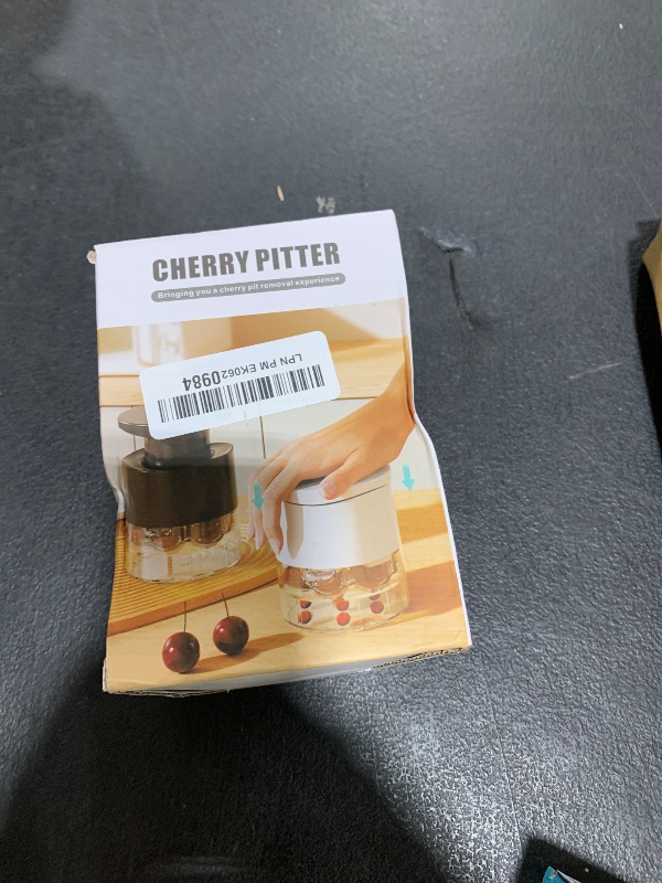 Photo 1 of Cherry Pitter Multiple, Quick Release Multi Cherries Stoner Pitter 7-in-1, Push Button Cherr'y Core Pit'ter Tool with Splatter Protector, Pit Seed Remover for Making Jam Cherry Dishes (Black-7-Hole)