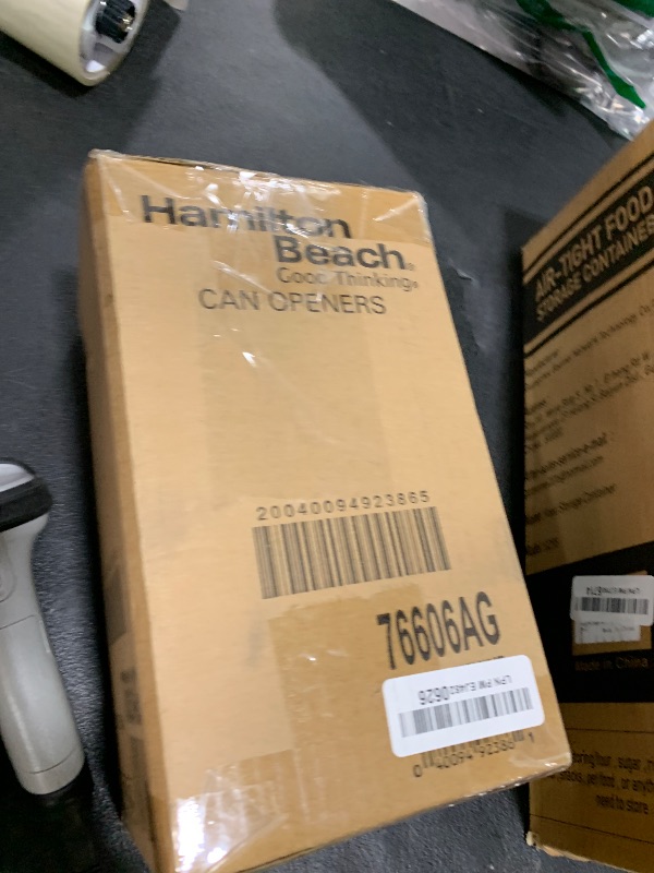 Photo 1 of Hamilton Beach Smooth Touch Electric Automatic Can Opener with Easy Push Down Lever, Eliminates Sharp Edges, Opens All Standard-Size and Pop-Top Cans, Extra Tall, Black and Chrome (76606AG)