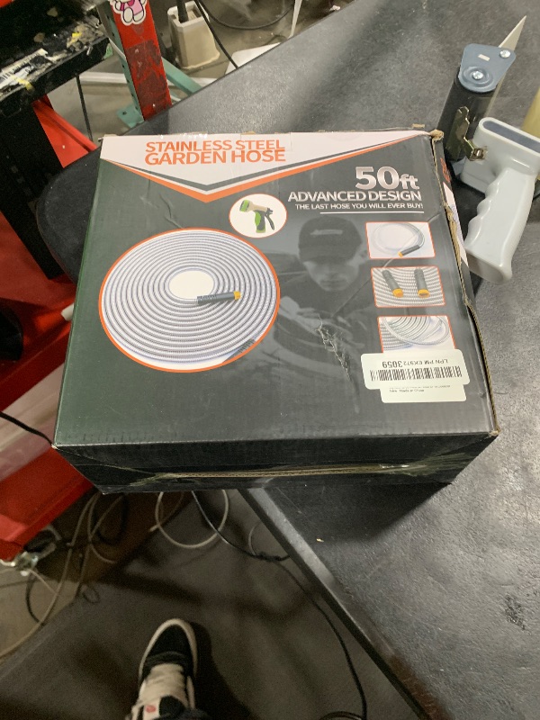 Photo 1 of Garden Hose 50 ft, Stainless Steel Water Hose with 10 Function Nozzle Flexible, Heavy Duty, Lightweight, No-Kink, Pet Proof, Puncture Proof Hose Metal for Yard, Outdoor