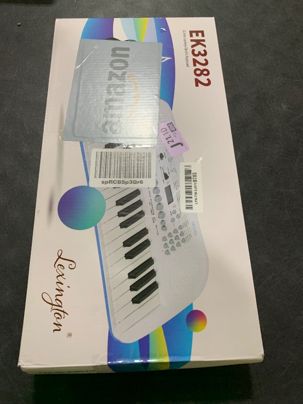Photo 1 of Lexington 32 Key Electric Keyboard, Small Digital Piano for Beginners, Mini Portable Musical Gift (EK3282, White)
