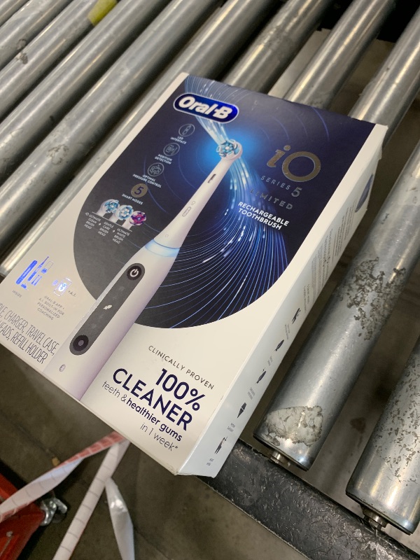 Photo 1 of Oral-B iO Deep Clean + Whiten Rechargeable Electric Toothbrush with Visible Pressure Sensor, 2 Minute Timer, 5 Cleaning Settings, 1 iO5 Limited, 3 Toothbrush Heads, Travel Case & Refill Holder, White