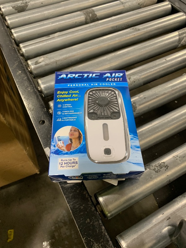 Photo 1 of Arctic Air Pocket Small Portable Fan, Powerful, Personal Air Cooler with 3 Adjustable Speeds, 12-Hour Battery Life, Hand Fan for Indoor and Outdoor Use
