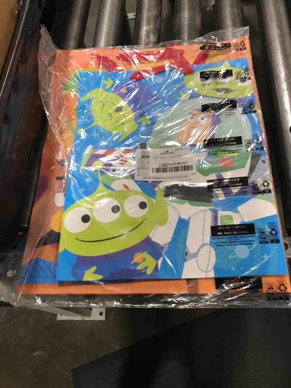 Photo 1 of Hallmark Disney Pixar Toy Story Gift Bags for Kids (2 Bags: 1 Large 13", 1 Extra Large 15") for Birthdays, Back to School, Christmas