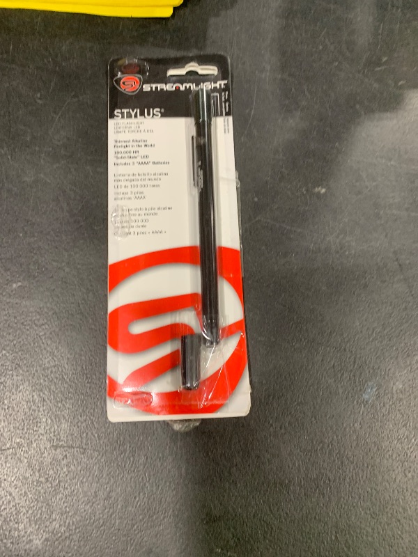 Photo 1 of Streamlight 65022 Stylus 2-Lumen Blue LED Pen Light with 3 AAAA Alkaline Batteries, Black