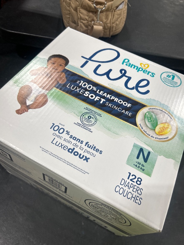 Photo 1 of Pampers Pure Protection Baby Diapers, Size 0 (10 lbs ), 128 Count, Up to 100% Leakproof, Premium Plant-based Skin Protection, Hypoallergenic Soft Diapers
