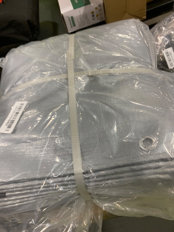 Photo 1 of 16Mil Tarps Heavy Duty Waterproof 16x20 Finished Size, Large Outdoor Multipurpose Protective Cover (Silver/Black)