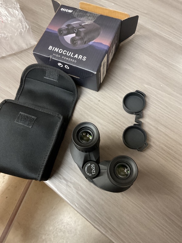 Photo 1 of Occer 12x25 Compact Binoculars for Adults and Kids, Large Eyepiece Waterproof Binocular with Low Light Vision,High Powered Easy Focus Binoculars for Bird Watching,Outdoor Hunting,Travel,Sightseeing