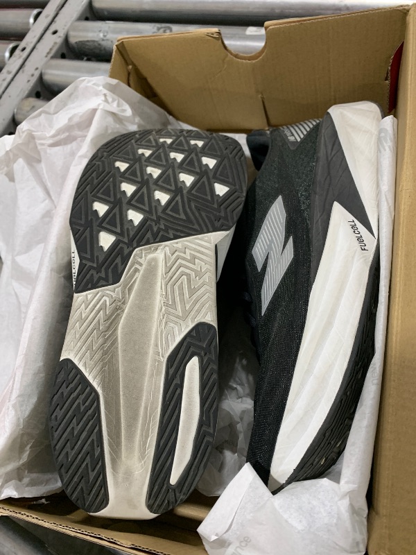 Photo 1 of New Balance Men's FuelCell Rebel V5 Running Shoe, Black/Silver Metallic/White, 11.5 Wide