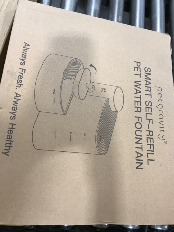 Photo 1 of refill pet water station 