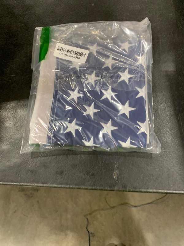 Photo 1 of American Flag 2x3 Ft, US Flag/USA Flag with Oxford Polyester Material, Vivid Color, Sewn Stripes, Brass Grommets, Embroidered Stars, Perfect for Indoor/Outdoor Use