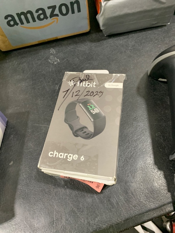 Photo 1 of Fitbit Charge 6 Fitness Tracker with Google apps, Heart Rate on Exercise Equipment, 6-Months Premium Membership Included, GPS, Health Tools and More, Obsidian/Black, One Size (S & L Bands Included)