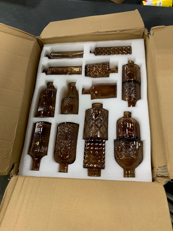 Photo 1 of Liengoron  Vase Set of 30 in Bulk Amber Glass Bud Vase 30 Pack Bud Vases for Centerpieces Vintage Amber Mini Flower Vases for Home Centerpieces Wedding Decorations