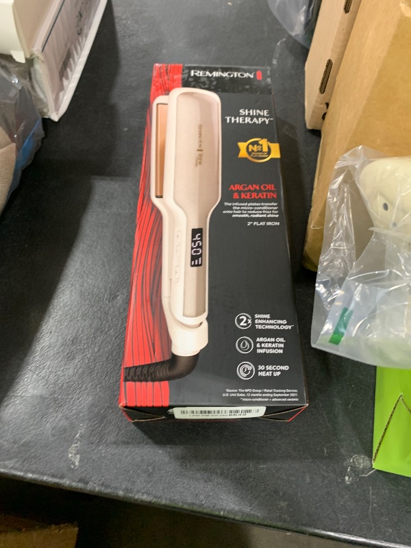 Photo 1 of Remington Shine Therapy 2 inch Hair Straightener, Flat Iron Infused with Argan Oil & Keratin, Professional Ceramic Flat Iron for Less Frizz, Shiny & Smooth Hot Styling Tools