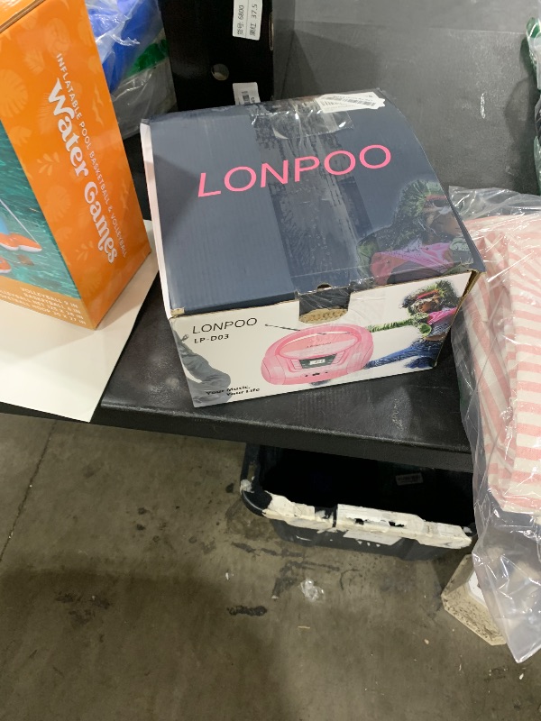 Photo 1 of LONPOO Portable Boombox - CD Player, Bluetooth, USB, MP3, AUX, FM Radio, Portable, Built-in Stereo Speakers, Carrying Handle, LCD Display, Pink