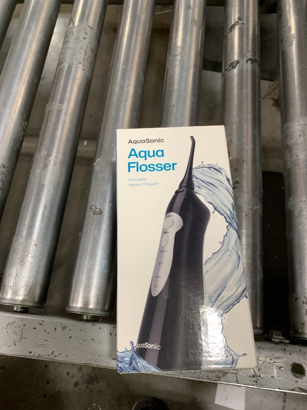 Photo 1 of AquaSonic Aqua Flosser - Cordless Rechargeable Water Flosser for Teeth - Waterproof, Portable Oral Irrigator for Dental Cleaning with 5 Jet Tips – Braces Home Travel