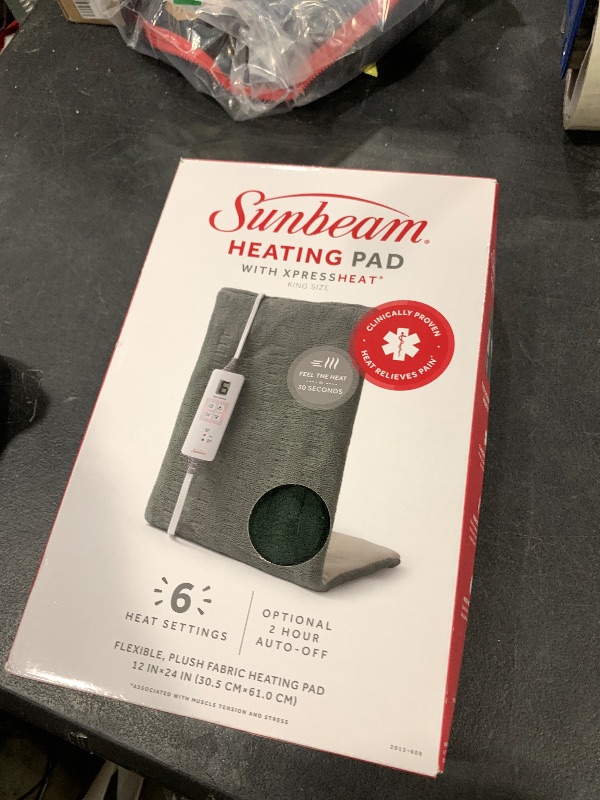 Photo 1 of Sunbeam XL Heating Pad for Back Neck and Shoulder Pain Relief Auto Shut Off 6 Heat Settings Extra Large 12 x 24 Green Ideal for Muscle Aches and Arthritis Pain
