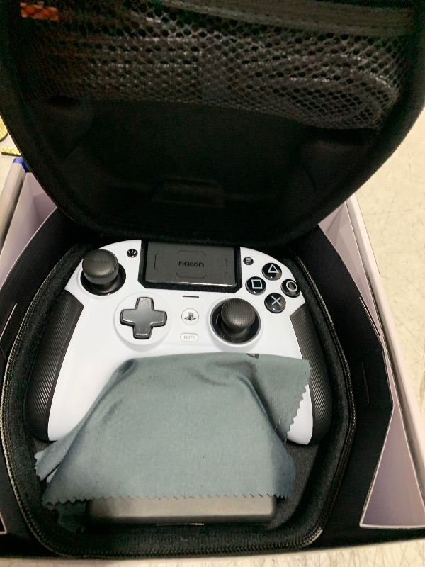 Photo 1 of NACON Revolution 5 Pro Officially Licensed PlayStation Wireless Gaming Controller for PS5 / PS4 / PC - Hall Effect, Trigger Stops, Mappable Buttons, Bluetooth Audio - White