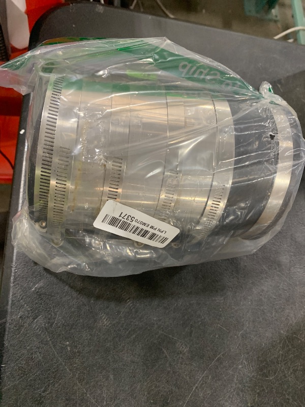Photo 1 of Fernco 4-inch XL Flexible Pipe Coupling Connector Fitting with Stainless Shield, Below Ground Plastic, Cast Iron, Steel