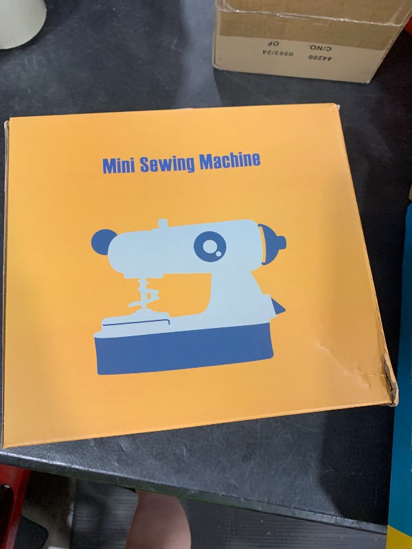 Photo 1 of WASAIQI Mini Sewing Machine, Upgraded Electric Sewing Machine with Sewing Bag, Expansion Board, LED Light, Fast Stitch Suitable for Clothes,Jeans,Cutains,DIY Home Travel